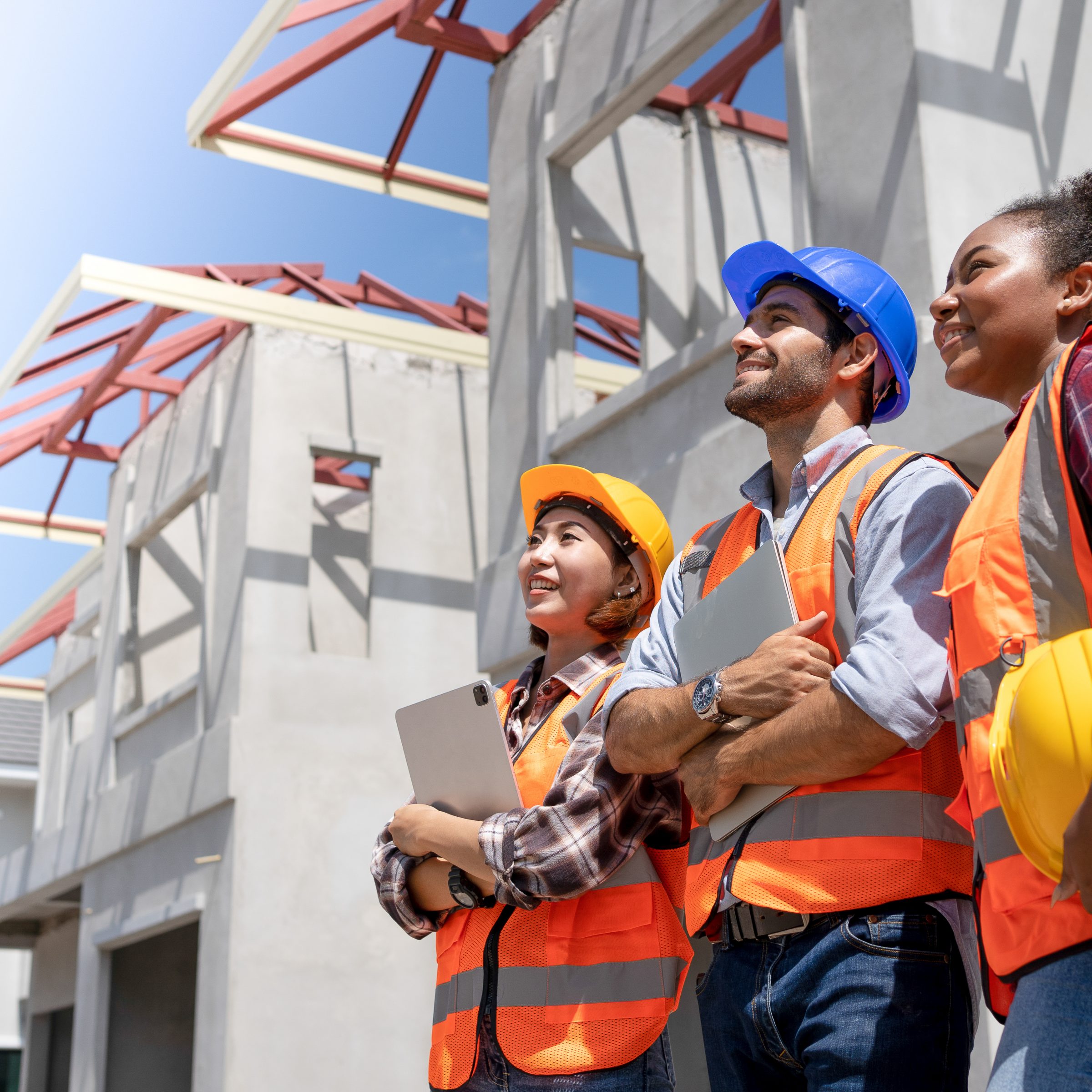 Image of a group of people in hardhats and high-visibility vests